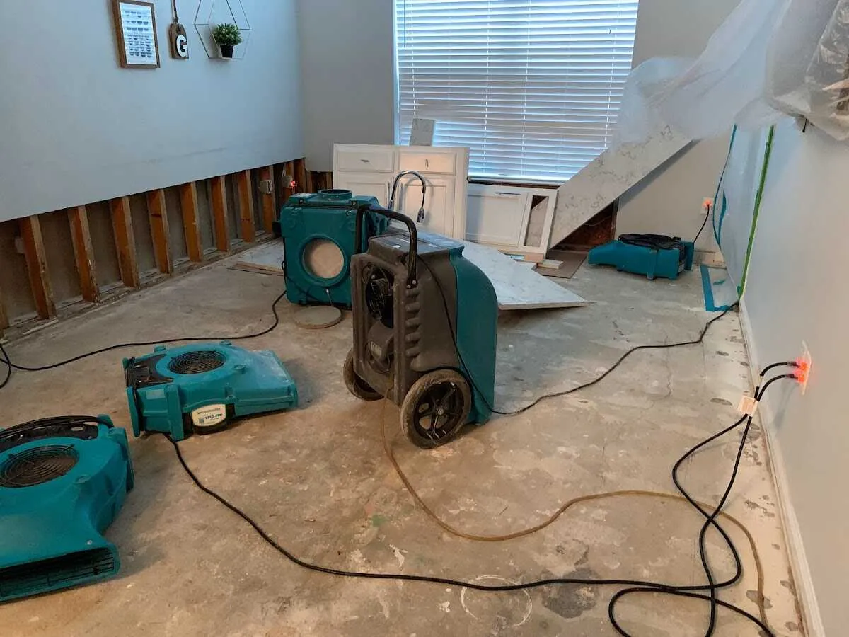 Dehumidifier in flood-cut room for Water Damage Restoration in Alexandria